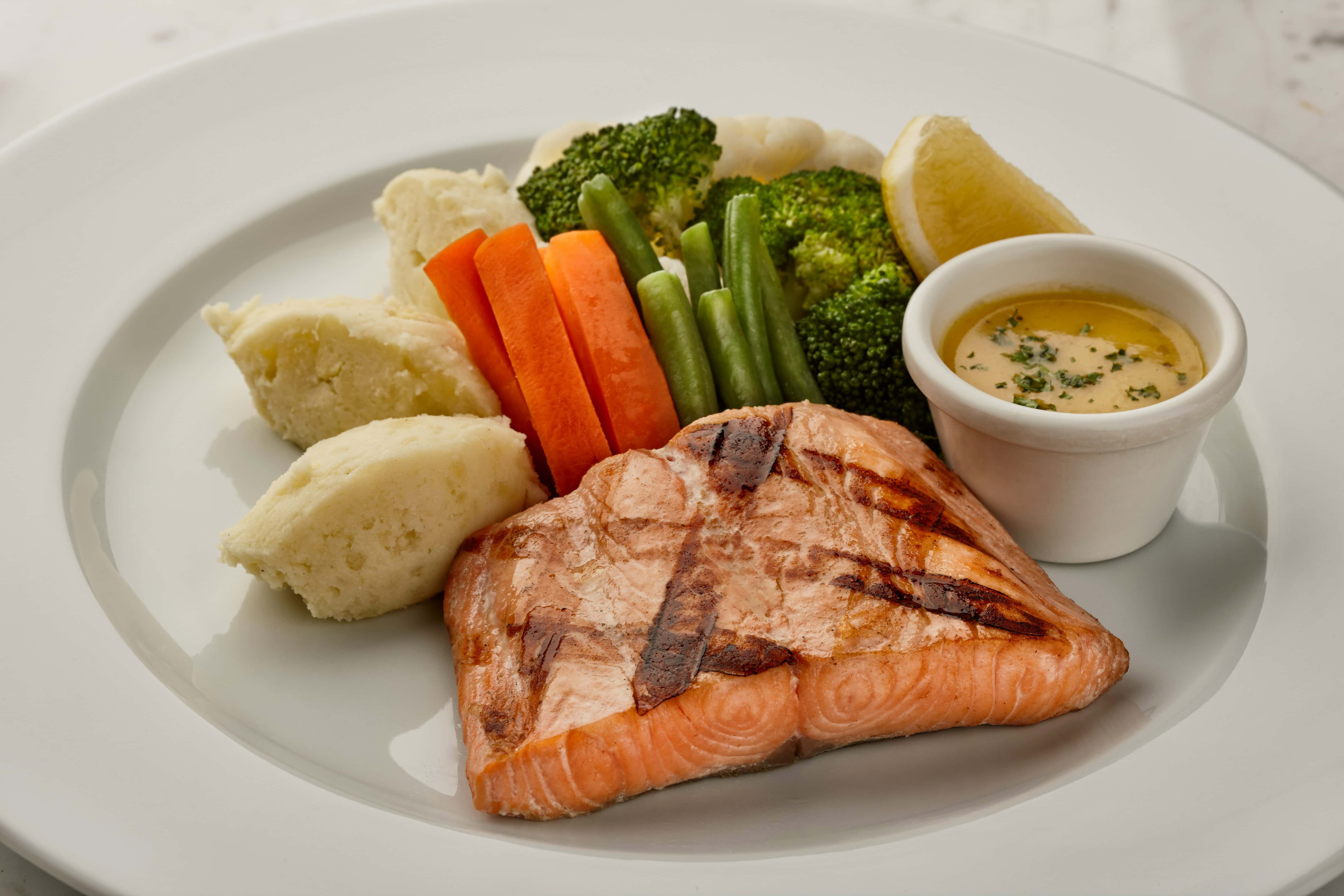 Cooked Salmon with sweet potato and other foods